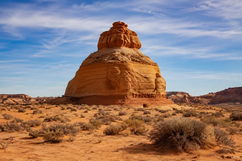 Red sandstone butte and desert scrub in the Washington County landscape